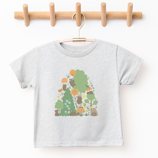 bears in foret kid's graphic tee. Bears playing and parachuting, tall trees, butterflies and flowers 